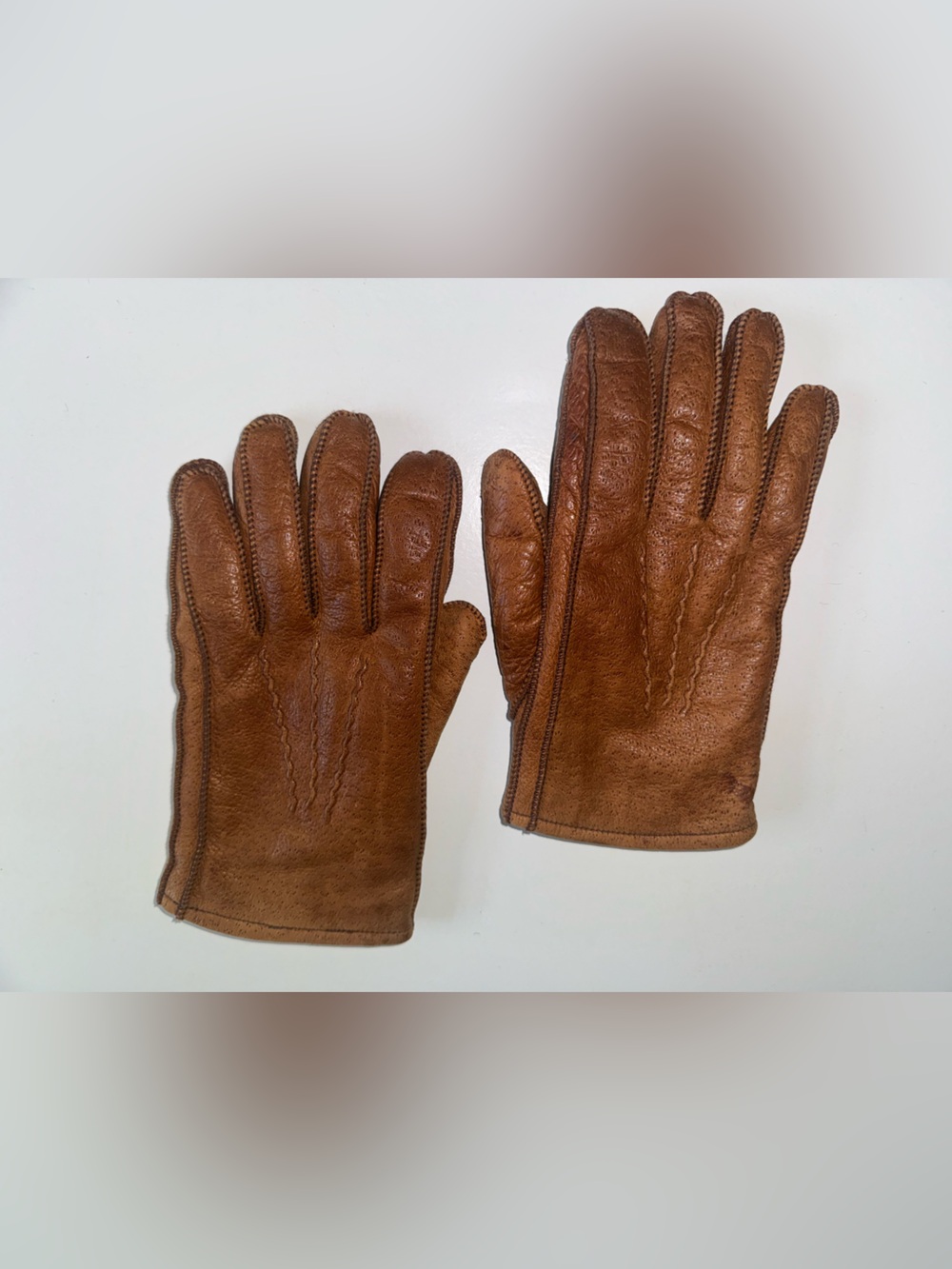 Brown Leather gloves with rabbit fur lining.